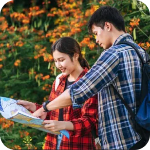 Different traveller types – business, family, solo, and budget travellers covered by Etiqa TripCare360.